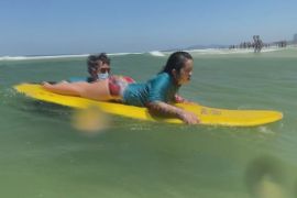 Серфінг без кордонів: як люди з інвалідністю підкорюють хвилі